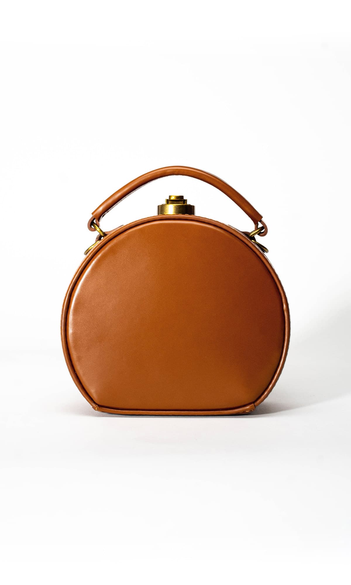 Freya caramel leather handbag with curved round shape